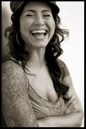 Kim Saigh Portrait Tattoo On Right Arm